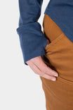 Detail view of the Honed Long Sleeve Thermal Henley by Dovetail Workwear in Atlantic Blue and Kodiak Brown, showing reinforced elbow and thumbhole features