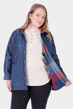 Durham Reversible Quilted Shirt Jac by Dovetail Workwear in Loden Green Plaid quilted with plaid flannel lining, worn open by a woman over a cream henley and black pants