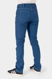 Back view of a woman wearing Dovetail Workwear GO TO™ Stretch Canvas Pant in Atlantic Blue, showing reinforced knees and nested pockets