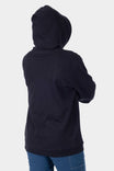 Back view of a woman wearing the Dovetail Workwear GO TO™ Hoodie in Carbon Black, showcasing the relaxed fit and reinforced elbows design