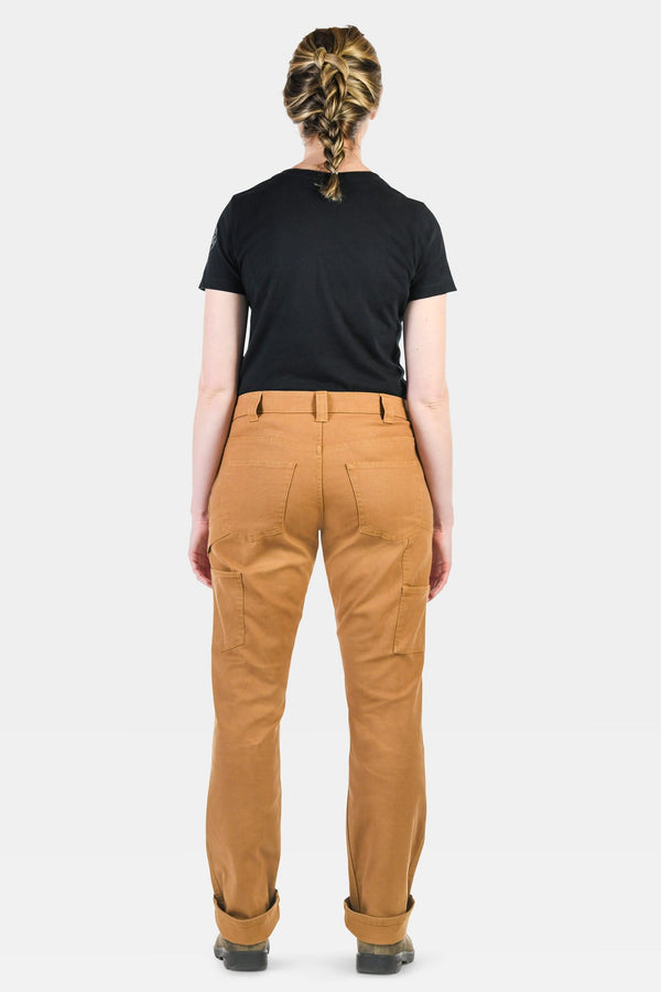 Back view of a woman wearing Dovetail Workwear Anna Maternity Work Pants in Saddle Brown Stretch Canvas with rolled cuffs, nested pockets, and reinforced knees