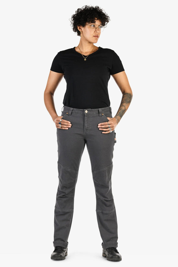 GO TO™ Stretch Canvas Pant in Cement Grey by Dovetail Workwear shown on a woman wearing a black t-shirt, featuring articulated knees, reinforced knee, and a straight leg silhouette