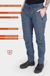 Dovetail Workwear Christa X COOLSWAP™ Pant in Dovetail Blue with labeled features including EZWaist™ stretch waistband, front zip pockets, tool loop, phone pocket, and reinforced articulated knees, shown on a woman from waist down