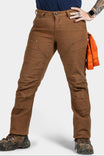 Britt Utility Pant in Saddle Brown Canvas by Dovetail Workwear shown on a woman wearing hiking boots, featuring reinforced knees, nested pockets, and a tool loop