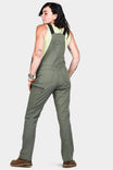 Back view of a woman wearing Dovetail Workwear's Freshley Overalls in Lichen Green Ultralight Ripstop, showcasing the relaxed leg and functional design