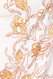 Close-up detail of the Rae Ripple x Dovetail Workwear Love Language T-Shirt in buttermilk, showcasing the iconic hand-drawn metal flower design
