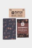 Rae Ripple X NoSo Patch by Dovetail Workwear featuring peel and stick fabric patches with wings and bloom art in buttermilk, black, and black colorways, displayed with product packaging