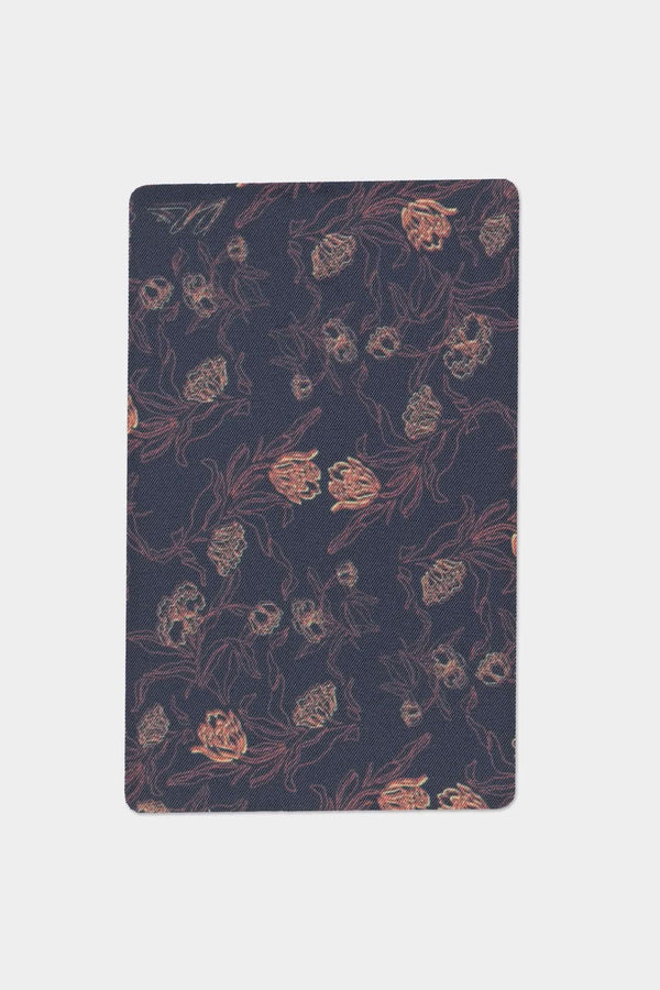 Dovetail Workwear Rae Ripple X NoSo Patch in Brave Wings Black, displaying the peel-and-stick weather-resistant design with botanical motifs on dark fabric