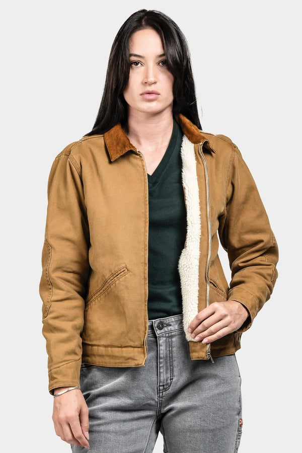 Old School Trucker Canvas Work Jacket in Vintage Brown by Dovetail Workwear, worn by a woman, featuring faux shearling lining and reinforced elbows