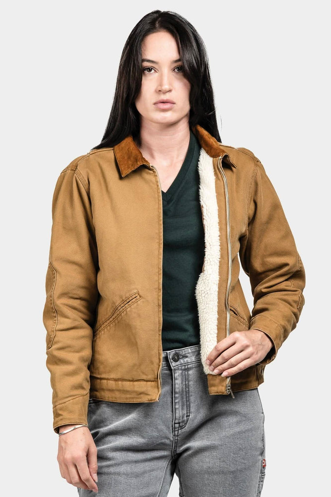 Old School Trucker Canvas Work Jacket in Vintage Brown by Dovetail Workwear, worn by a woman, featuring faux shearling lining and reinforced elbows