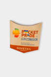 Dovetail Workwear's Lisa Congdon Pocket Pride bandana package featuring a colorful rainbow heart design and Progress Pride flag details on a 20" x 20" machine washable cotton bandana.