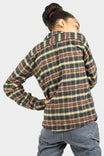 Back view of a woman wearing the Givens Work Shirt in Stretch Flannel in Coffee by Dovetail Workwear, paired with denim jeans