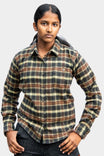 Givens Work Shirt in Stretch Flannel in Coffee plaid by Dovetail Workwear, worn by a woman in a front-facing pose showcasing the shirt's flattering fit and chest pocket detail