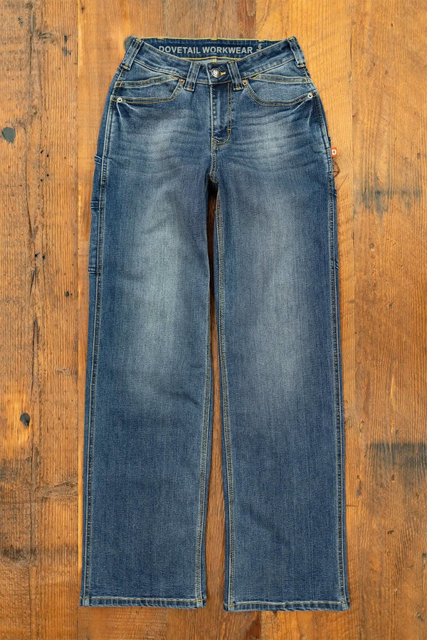 Dovetail Workwear Old School Wide Leg Jeans in Classic Indigo displayed flat on wooden background, showing full-length front view with visible thigh pockets and wide leg silhouette