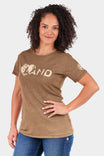 John Deere X Dovetail Workwear Heartland T-Shirt in Sawdust Brown worn by a woman, featuring a graphic logo and short sleeves