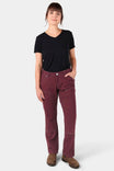 Woman wearing Dovetail Workwear's Anna Taskpant in Elderberry Canvas, a mid-rise relaxed-fit work pant with visible Hip Slot™ Tool loop and multiple pockets, paired with a black v-neck tee