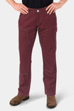 Front view of a woman wearing the Anna Taskpant in Elderberry Canvas by Dovetail Workwear, showcasing the mid-rise fit, relaxed leg, and visible pockets with contrasting topstitching