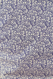 Close-up detail of the Navy Carver Work Shirt by Dovetail Workwear, showcasing the paisley print in cream on navy fabric