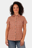 Dovetail Workwear Carver Work Shirt in paprika with paisley print, short sleeves, button front, and chest pockets, worn by a woman against a white background