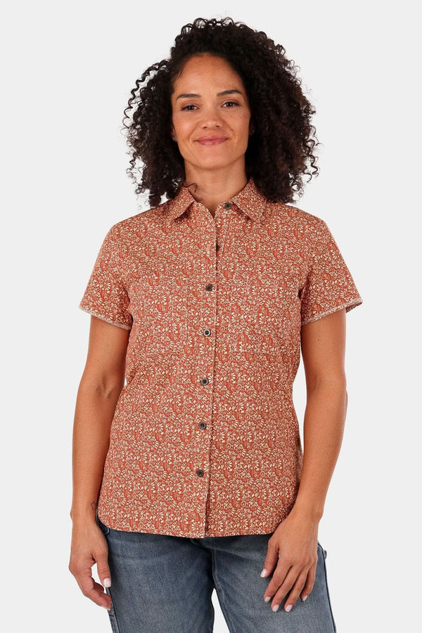 Dovetail Workwear Carver Work Shirt in paprika with paisley print, short sleeves, button front, and chest pockets, worn by a woman against a white background