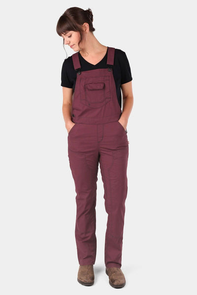 Elderberry Maroon Freshley Overalls in Ultralight Ripstop by Dovetail Workwear worn by a woman with black t-shirt, featuring reinforced front and nested pockets and kneepad slots