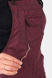 Close-up side view of the Freshley Overalls in Elderberry Maroon by Dovetail Workwear, showing the Hip Slot™ and reinforced seam details on the thigh pocket