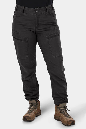 Woman wearing Dovetail Workwear Provisions Lightweight Ripstop Cargo Pant in Faded Black, paired with brown hiking boots