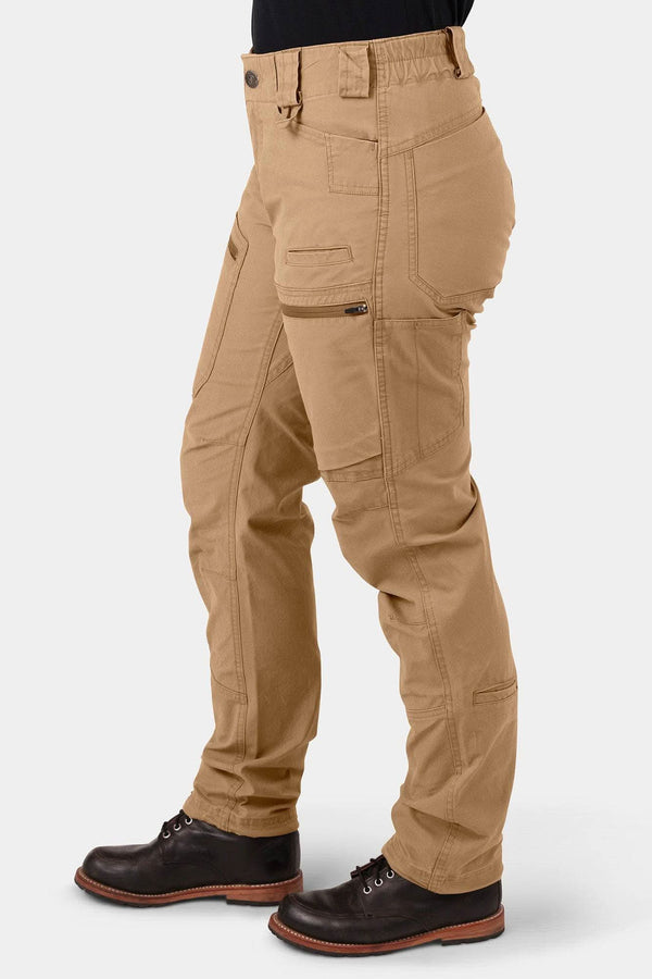 Side view of a woman wearing Dovetail Workwear Provisions Lightweight Ripstop Cargo Pant in Tan Sandstone, featuring multiple cargo pockets and relaxed leg fit