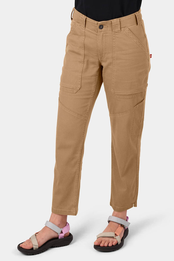 Range Crop Pant in Lightweight Denim by Dovetail Workwear in Sawdust Brown, featuring bellowed front pockets and relaxed leg fit, worn by a woman with 28" cropped inseam