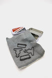 Dovetail Workwear Repair Kit displayed with metal hip buttons and clasps on a fabric swatch alongside retail packaging
