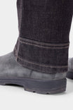 Close-up detail of the cuff on Dovetail Workwear's Old School High Rise Graphene Denim Pant in Heather Black, showing the Tough Cuff™ reinforced hem and durable construction
