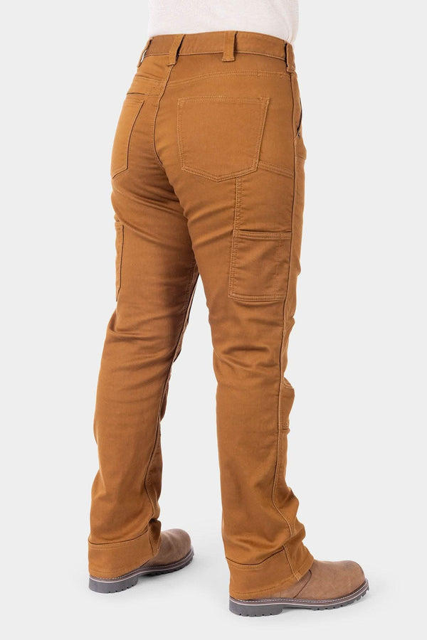 Back view of a woman wearing Dovetail Workwear's Britt Utility HOTSWAP™ Pant in Saddle Brown Thermal Denim, highlighting cargo-style pockets, straight leg fit, and thermal denim construction