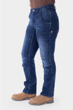 Indigo Britt X Graphene Denim Pant by Dovetail Workwear shown on a woman, featuring cargo-style pockets, crotch gusset, and reinforced panels in a straight-leg silhouette