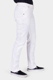 Side view of a woman wearing Dovetail Workwear GO TO™ Stretch Canvas Work Pant in Painter's White with visible tool loop and deep pockets