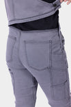 Back view of Dovetail Workwear's Freshley HOTSWAP™ Drop Seat Thermal Denim Overalls in Grey, highlighting the hidden zip drop seat and reinforced front pockets.