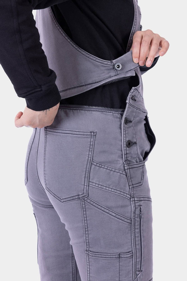 Detail shot of the hidden zip drop seat on Dovetail Workwear's Freshley HOTSWAP™ Thermal Denim Overalls in Black, shown open to demonstrate the innovative HotSwap™ feature