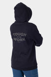 Back view of a woman wearing the Dovetail Workwear GO TO™ Graphic Hoodie in Carbon Black, featuring graphic text and reinforced elbows