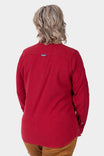 Back view of a woman wearing the Givens Stretch Chamois Work Shirt in Barn Red by Dovetail Workwear, showcasing the locker loop detail