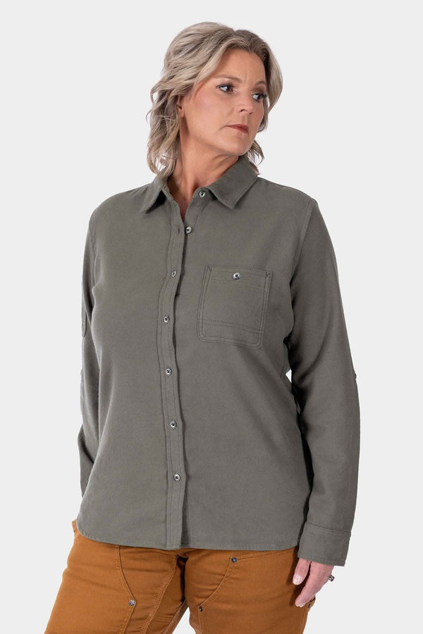Patina Green Givens Stretch Chamois Work Shirt by Dovetail Workwear worn by a woman with buttoned chest pocket and cuff tabs visible