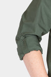 Close-up detail of the cuff tab and button on the Aventurine Green AJ COOLSWAP™ Work Shirt, shown on a woman's arm