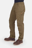 Side view of a woman wearing Dovetail Workwear's Anna Ultralight Trail Pant in Kelp Green Ripstop, featuring reinforced knees, nested pockets, and a straight leg fit
