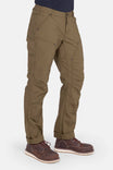 Anna Ultralight Trail Pant in Kelp Green Ripstop by Dovetail Workwear, featuring reinforced knees, nested pockets, and Hip Slot™ tool loop, shown cuffed on a woman wearing brown boots