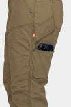 Detail shot of the Anna Ultralight Trail Pant in Kelp Green Ripstop by Dovetail Workwear, displaying a cargo pocket with a smartphone and nested pocket design