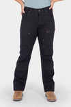 Dovetail Workwear Britt Utility Pant in No Fade Black Canvas, shown on a woman from waist down, featuring reinforced knees, nested pockets, and articulated knee design