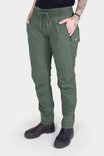 Dovetail Blue Christa X DIY COOLSWAP™ Pant by Dovetail Workwear shown on woman, featuring stretch waistband, front zip pockets, and reinforced knees