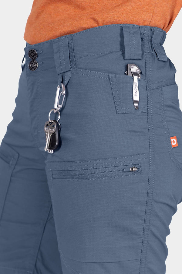 Close-up detail of the Compass COOLSWAP™ Cargo Short in Dovetail Blue by Dovetail Workwear, highlighting multiple pockets and waistband