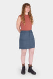 Woman wearing Dovetail Workwear Compass COOLSWAP™ Cargo Skort in Dovetail Blue, shown with stretch mesh undershorts and bellowed zip cargo pockets
