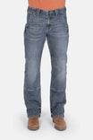 Front view of a woman wearing Dovetail Workwear's Day Construct Work Pant in Vintage Blue denim, featuring a mid-rise waist, reinforced pockets, crotch gusset, and knee pad slot