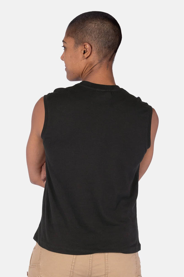 Back view of a woman wearing the Dovetail Workwear GO TO™ Tank Top in Black, showing the relaxed fit and perfect armhole coverage