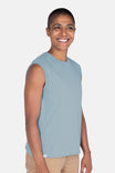 Side view of a woman wearing the Dovetail Workwear GO TO™ Tank Top in Shore Blue, showcasing the relaxed fit and perfect armhole coverage